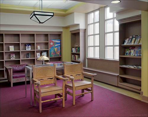 Chairs and bookshelves in the Herzstein reading room